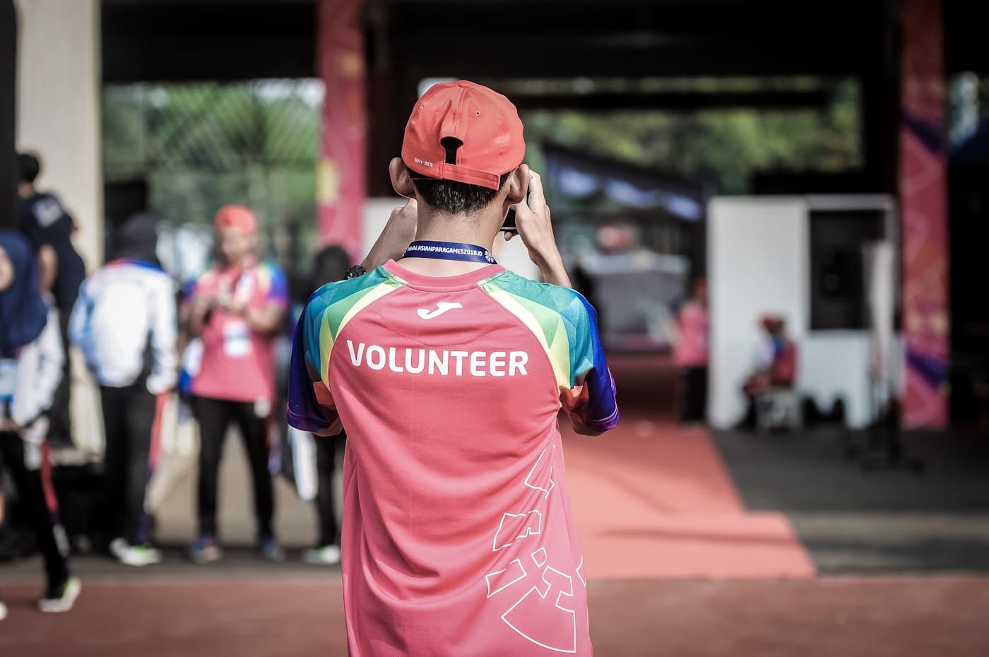 Women and volunteers gathered in a community programme