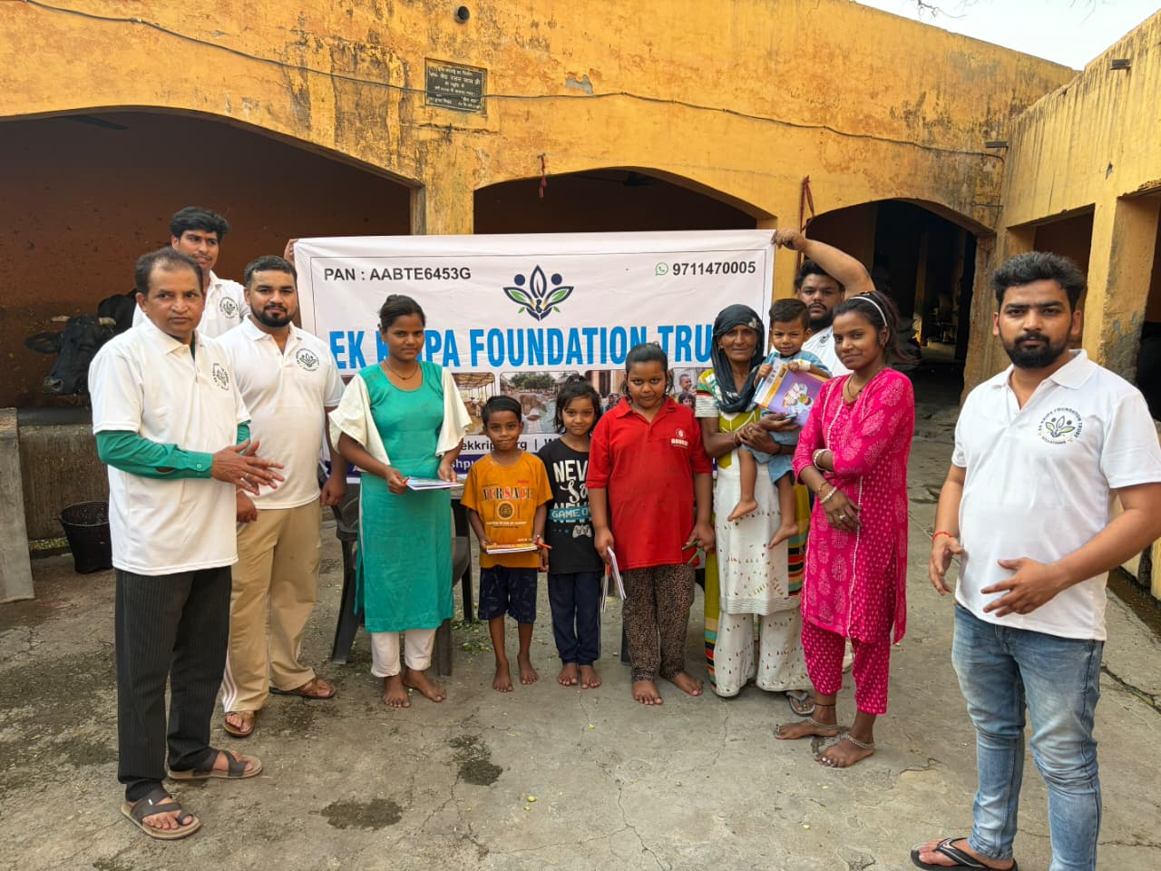 People visible during an EK Kripa Foundation community care activity